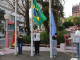 Marlene Ressler arriando a Bandeira do Brasil